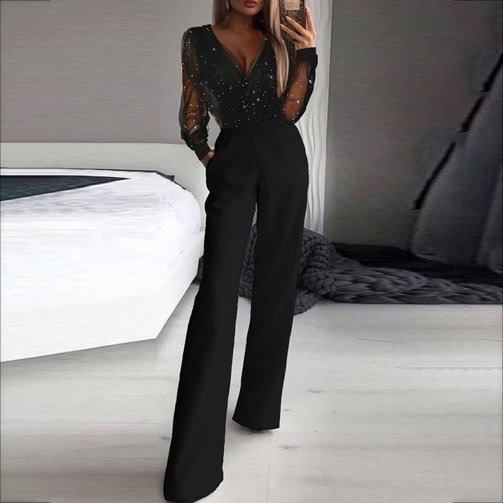Zwarte Hoymans vrijetijdsjumpsuit voor dames, een comfortabele en modieuze keuze voor elke gelegenheid. Casual chic.