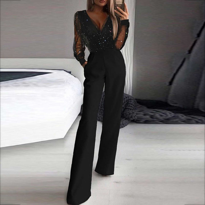 Zwarte Hoymans vrijetijdsjumpsuit voor dames, een comfortabele en modieuze keuze voor elke gelegenheid. Casual chic.
