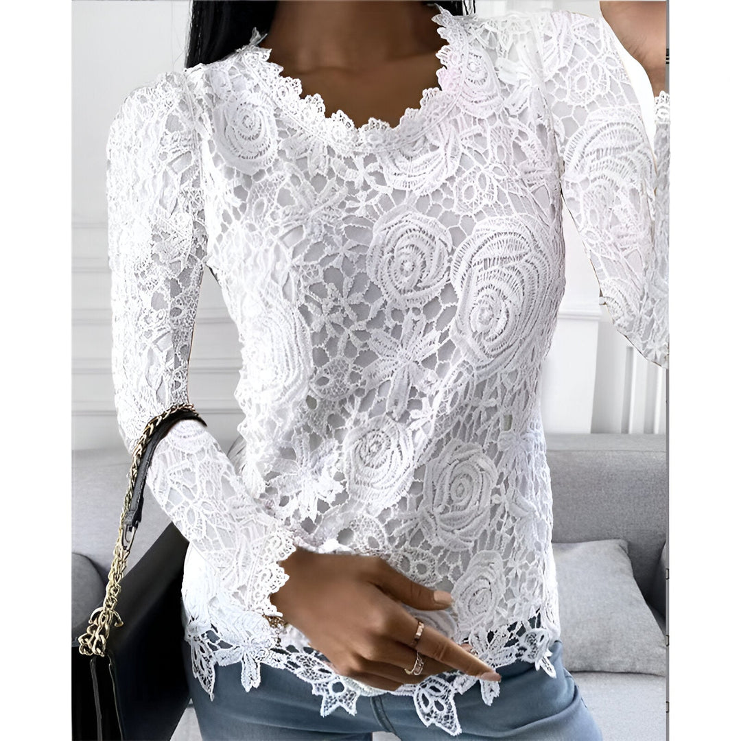 "Elegante kanten blouse met lange mouwen, vrouwelijke uitstraling, klassieke ronde hals, ideaal voor elke gelegenheid."