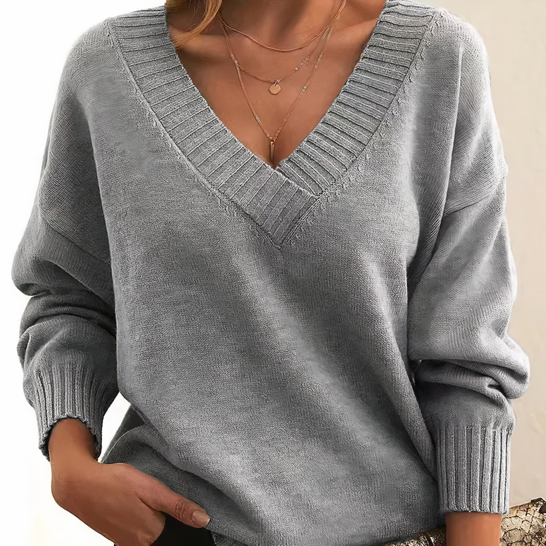 "Elegante kasjmier V-hals trui voor dames, warme beige kleur, combineert stijl met comfort, luxe uitstraling, tijdloos ontwer