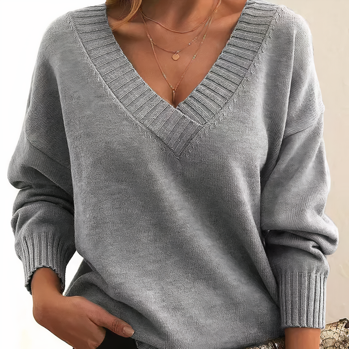 "Elegante kasjmier V-hals trui voor dames, warme beige kleur, combineert stijl met comfort, luxe uitstraling, tijdloos ontwer