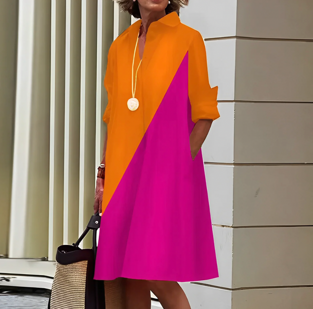 "Elegante Katarina midi jurk met lange mouwen, getailleerd silhouet en vrouwelijke uitstraling in diverse kleuren."