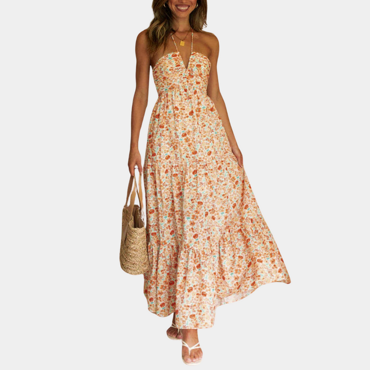 Elegante lange dames zomerjurk Soraya met halternek, comfortabel voor vakantie en casual gelegenheden.