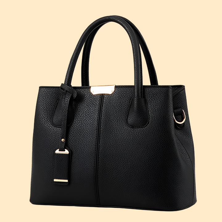 Detailopname van de elegante leren dames schoudertas. Toont de fijne afwerking en luxe uitstraling.
