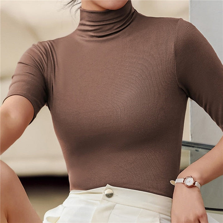 "Elegante minimalistische coltrui voor dames, aansluitende pasvorm met halve mouw, zachte elastische stof, veelzijdige stijl.