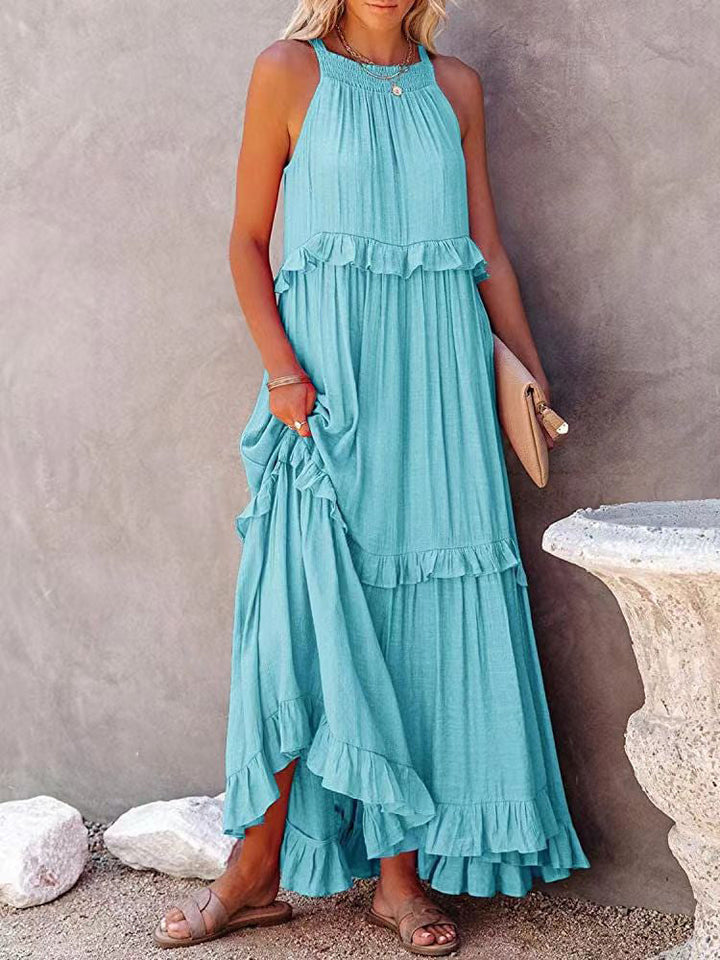 Stijlvolle dames maxi-jurk met opvallend strikdetail. Deze mouwloze, losvallende polyester blend jurk biedt zomerse elegantie.