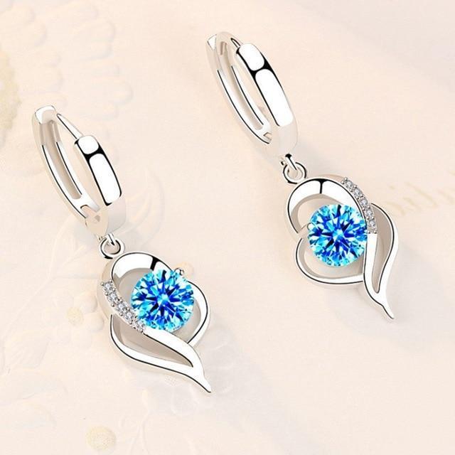 Elegante zilveren dames oorbellen met sprankelende zirkonia bloemen, perfecte sterling zilveren sieraden.