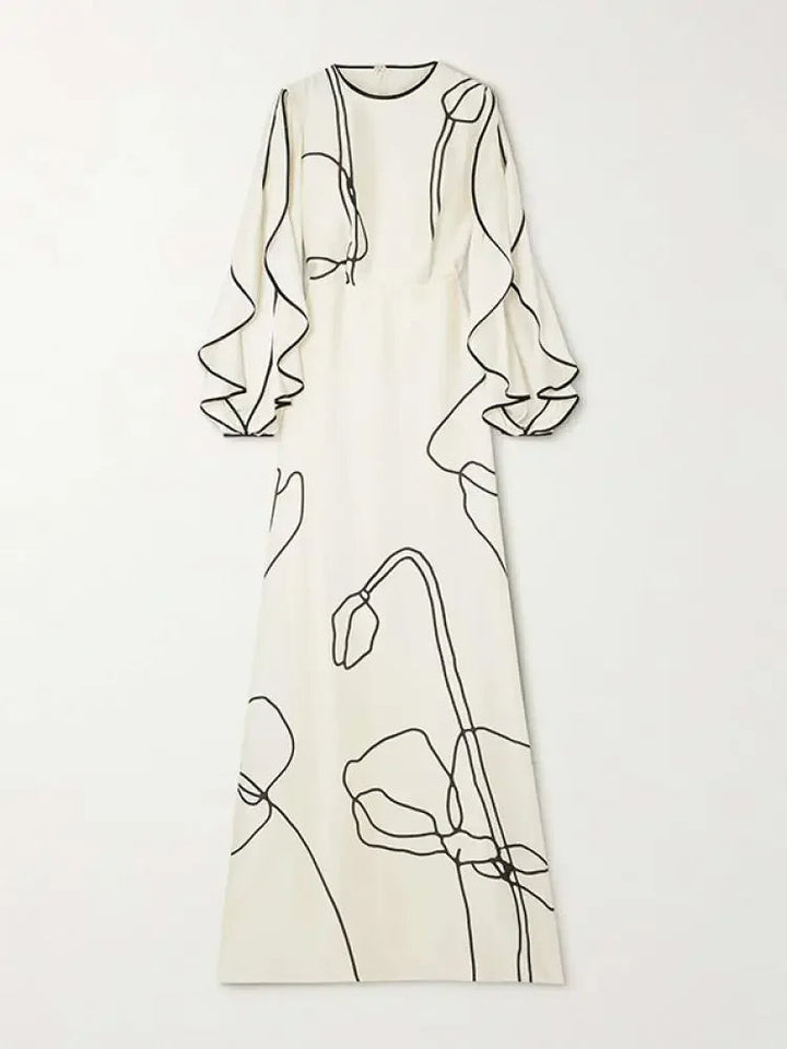 "Eline avondjurk met bloemenprint, gerimpelde mouwen en Falbala-details in witte en zwarte tinten, elegant ontwerp."
