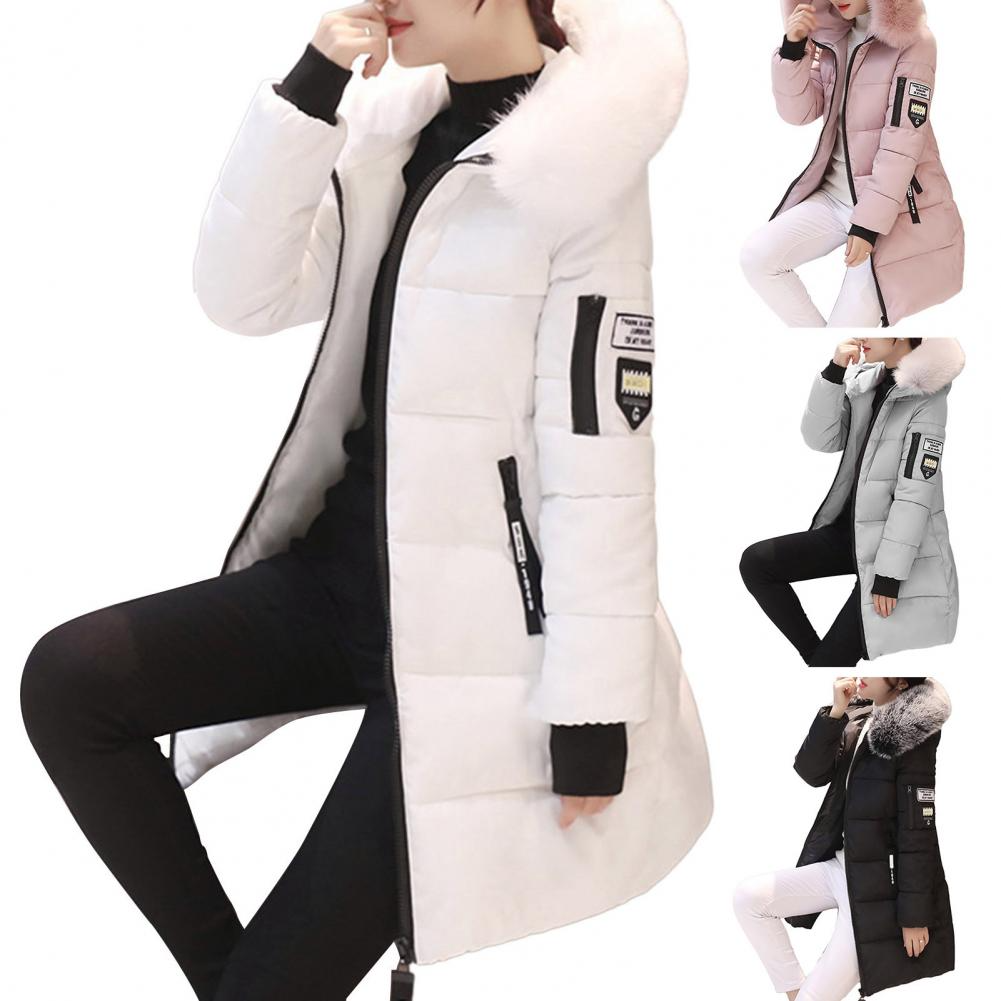 Profiel van comfortabele dames winterjas Elinora, met capuchon, ideaal voor de koude winterdagen.