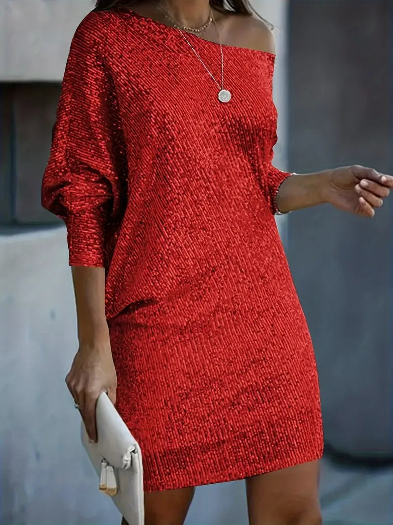 Vrouwelijke feestjurk met rode pailletten, perfect voor avondkleding