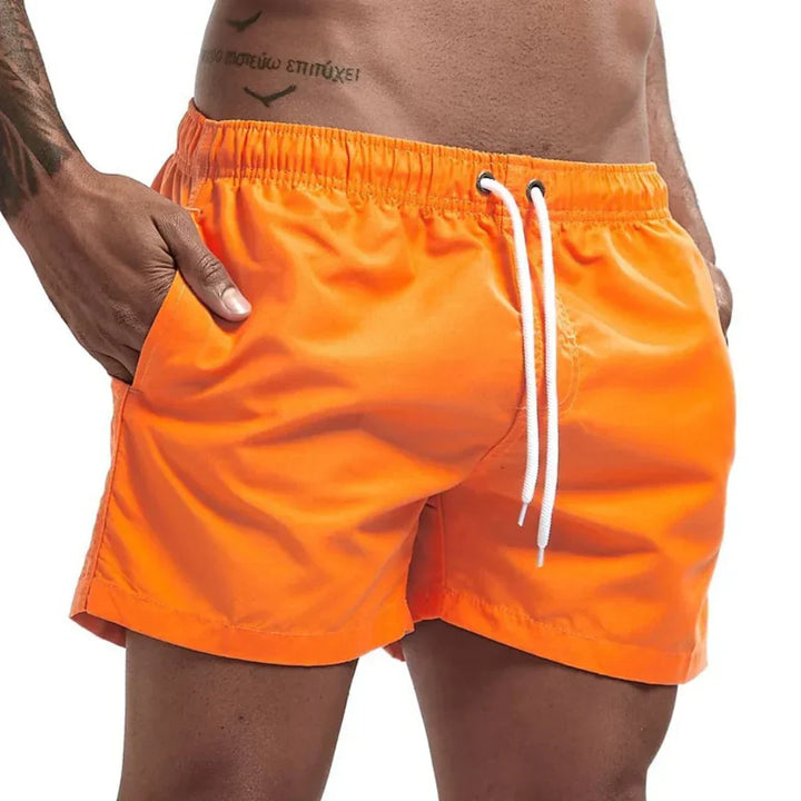 Heren sneldrogende zwemshorts in trendy kleur voor een dag aan het strand en zwembad