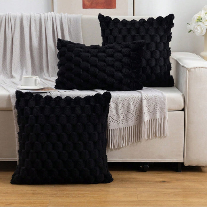 Decoratieve pluche kussenhoes voor je bank, voegt zachtheid en stijl toe aan je huisinrichting.
