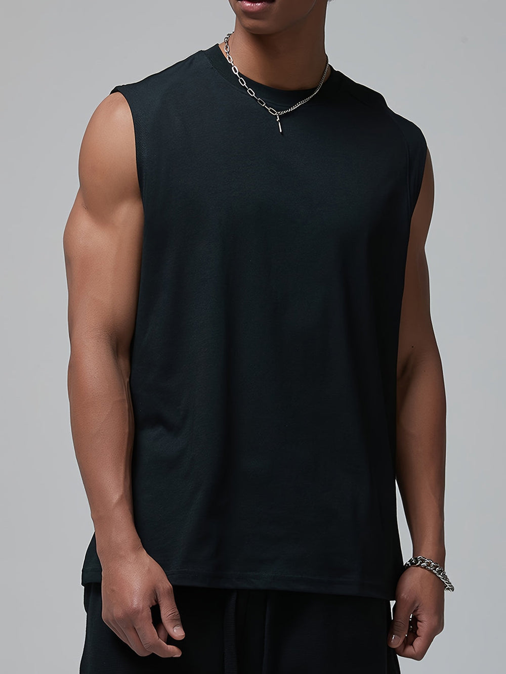 Effen witte heren tanktop, lichtgewicht en ademend. Comfortabel mouwloos shirt, ideaal voor zomerse dagen.