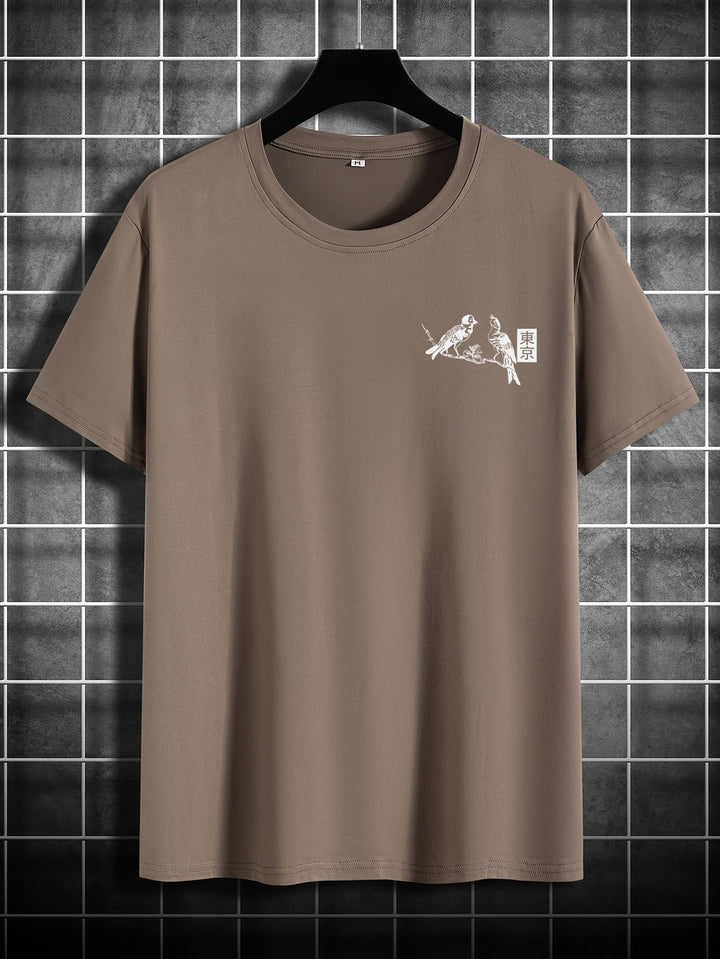 Modieus heren T-shirt met kleurrijke bloemen- en vogelprint, korte mouwen, ideaal voor zomerkleding.