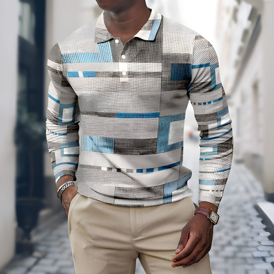 Heren poloshirt met lange mouwen, voorzien van een uniek grijs en blauw geometrisch patchwork patroon.