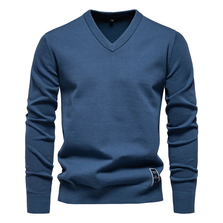 Tijdloze zwarte V-hals trui, ideaal voor zowel casual als semi-formele looks.