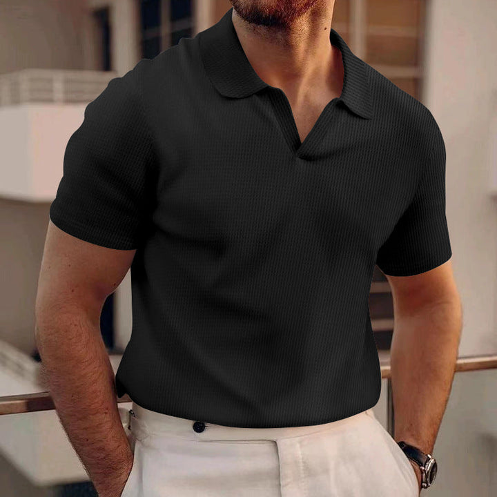 Zomerse heren polo shirt met unieke grid textuur in effen kleur. Ademend en comfortabel, voor een frisse casual stijl.