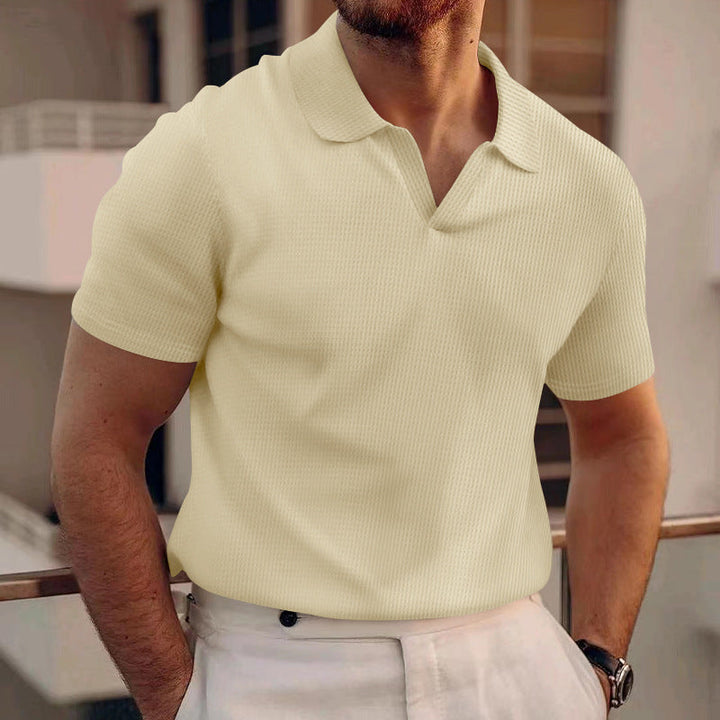 Klassieke heren polo met korte mouw, regular fit, en ademend materiaal. Perfect voor comfortabele, veelzijdige herenkleding.