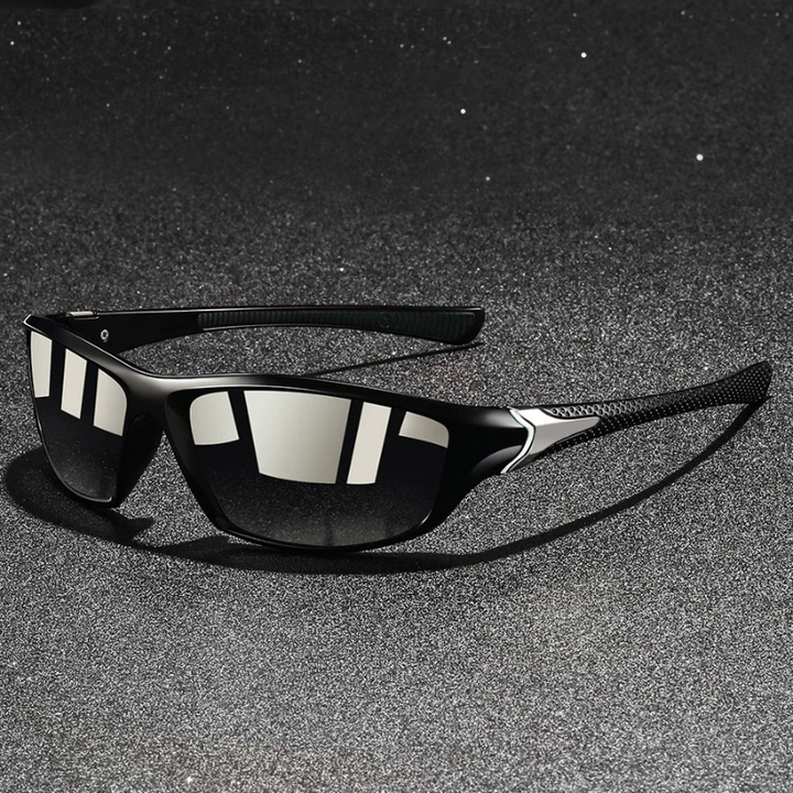 Zwarte heren zonnebril, gepolariseerd en UV400. Stijlvol, lichtgewicht accessoire voor ultieme oogbescherming.