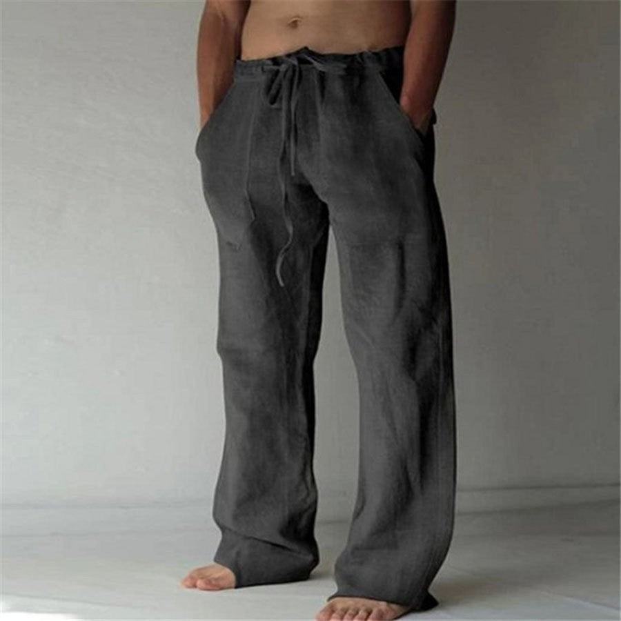 Detail van trekkoordsluiting op heren broek