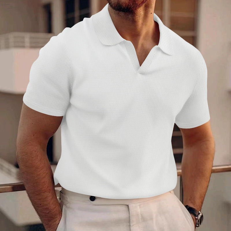 Heren polo shirt in effen kleur met stijlvolle grid textuur. Comfortabel, ademend, ideaal voor casual zomer looks.