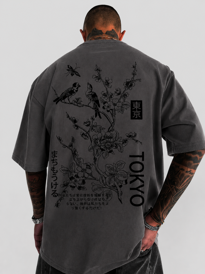 Zomers heren T-shirt met frisse bloemen en vogelprint, zachte stof, korte mouwen.