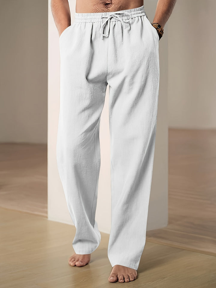 Volledige casual herenbroek met losse pasvorm en trekkoord, perfect voor vrijetijd en comfort.