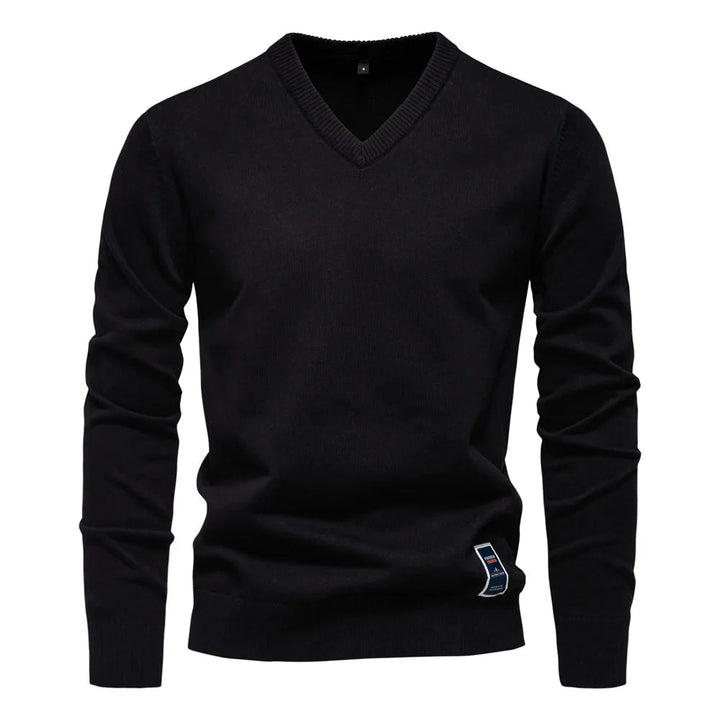 De Koen trui in marineblauw, een essentiële aanvulling op de herengarderobe.