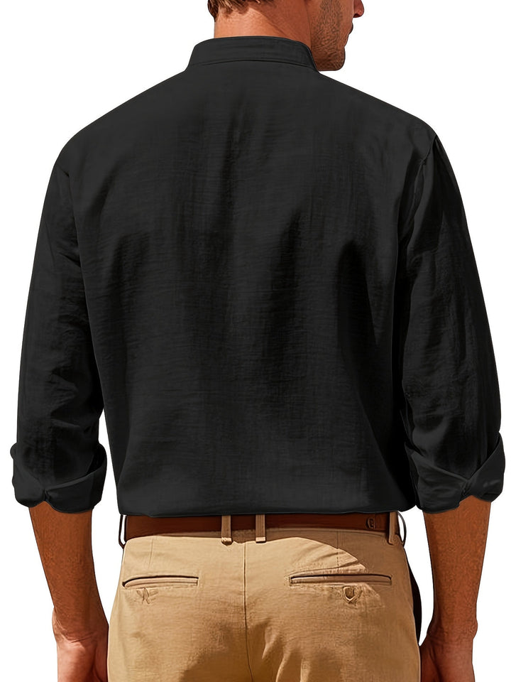 Vrolijk gekleurd Hawaiiaans herenoverhemd met lange mouw, comfortabel en losvallend voor casual zomerse dagen.