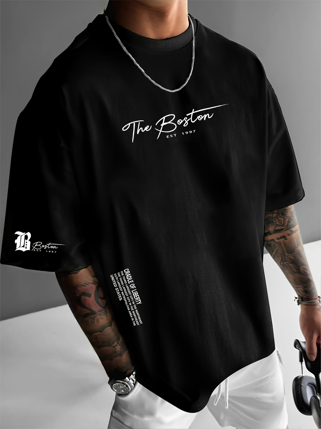 Losse pasvorm heren T-shirt met trendy slogan, comfortabele ronde hals, essentieel voor zomerse casual streetwear.