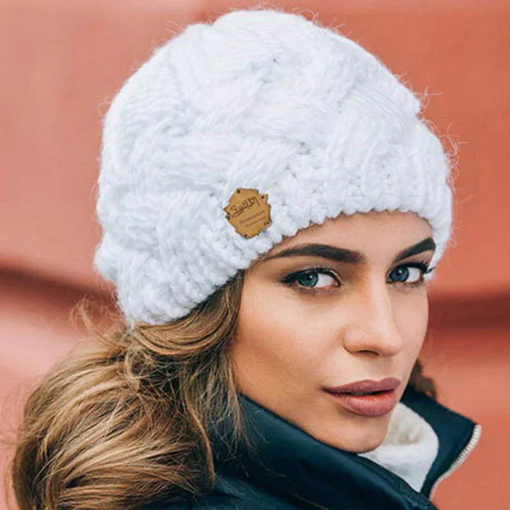 Veelzijdige gebreide wintermuts, zacht en warm, de ideale accessoire voor de moderne wintergarderobe.