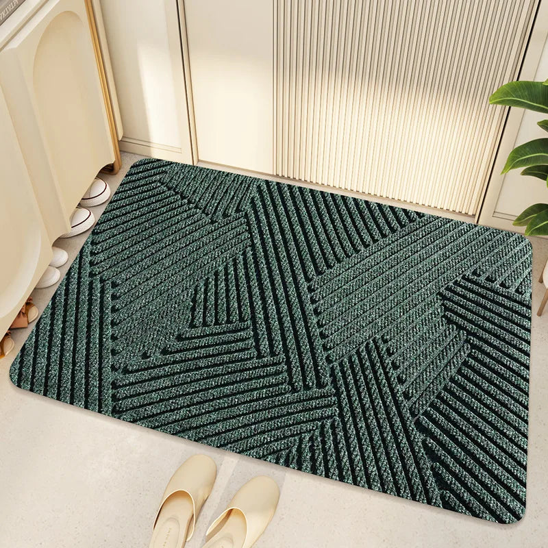 Stijlvolle schoonloopmat met geometrisch patroon. Duurzame binnen-/buitenmat, vuilafstotend voor een schone hal.