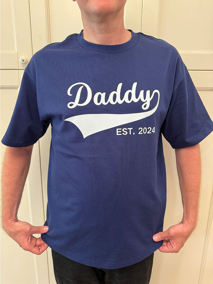 Comfortabele heren hoodie met 'DAD' opdruk, perfecte kleding voor elke vader.