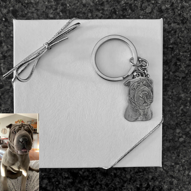 Premium roestvrij stalen sleutelhanger met scherpe foto van hond. Een duurzaam en gepersonaliseerd aandenken.