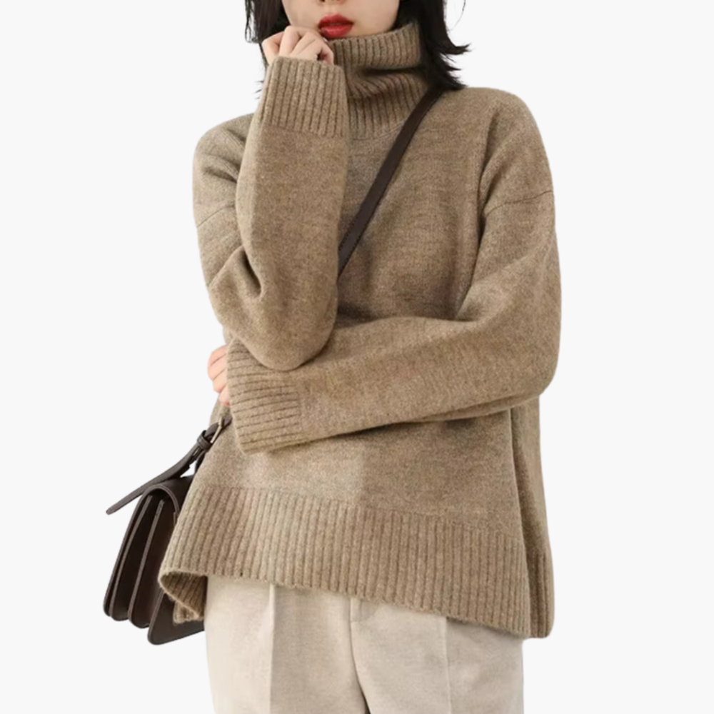 Zwarte dames coltrui met geribbelde textuur en lange mouwen. Ideaal voor casual winterkleding of elegante damesmode.