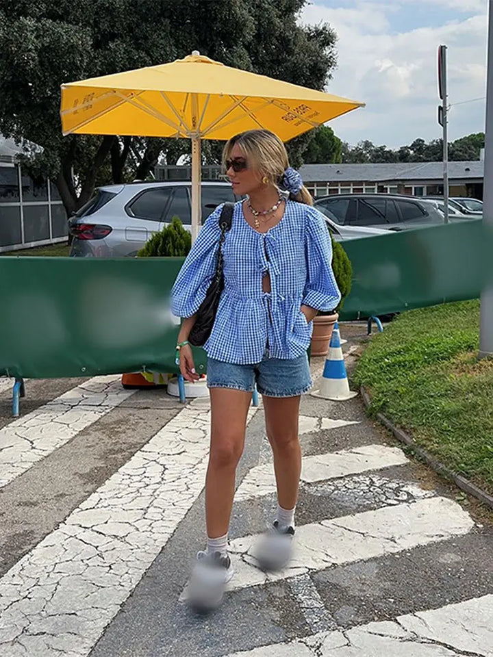 Casual geruite dames blouse met pofmouwen, ideaal voor een stijlvolle alledaagse of zakelijke look.