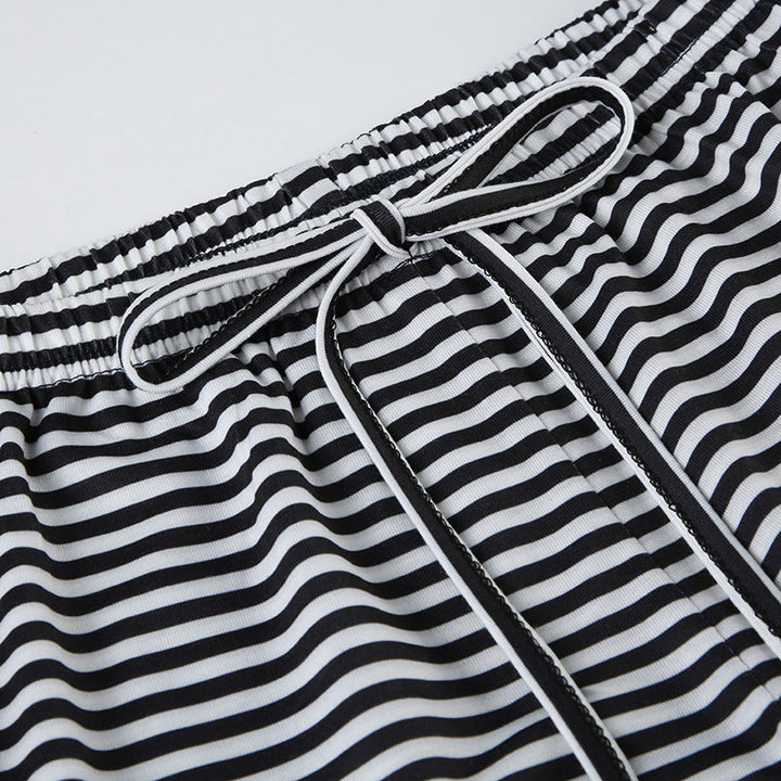 "Gestreepte loungebroek voor dames, casual en comfortabel, moderne lage taille, ideaal voor thuis of casual uitstapje."