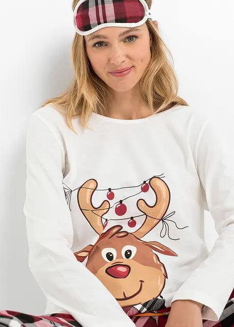 Detail van zachte, comfortabele matchende familie kerstpyjama met feestelijk winterpatroon. Ideale nachtkleding.