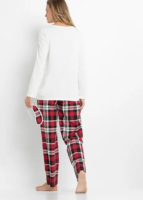 Stel genietend van de feestdagen in comfortabele, matchende dames- en heren kerstpyjama's. Gezellige nachtkleding.
