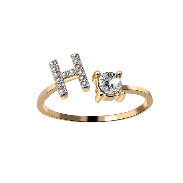 Zilverkleurige letterring O voor dames, minimalistisch en verstelbaar.