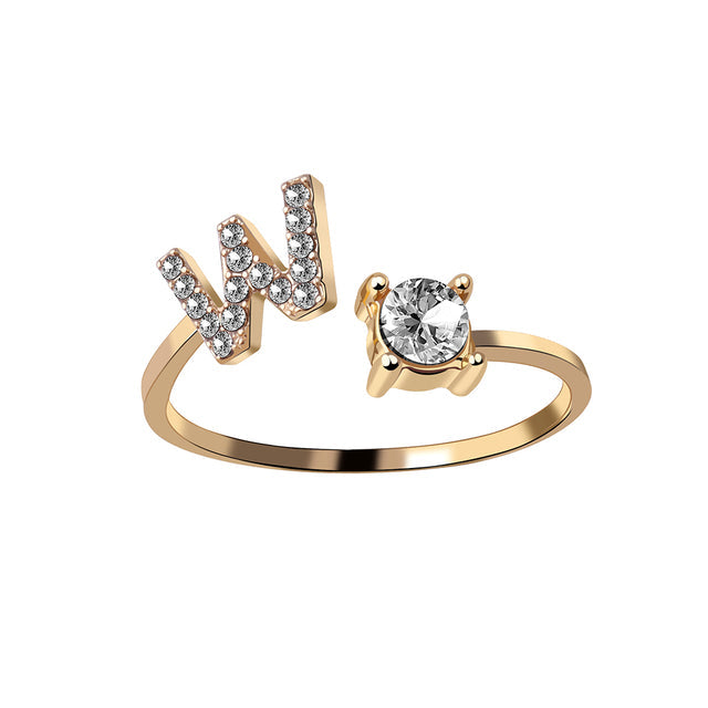 Zilverkleurige verstelbare initialenring, tijdloos en elegant voor dames.