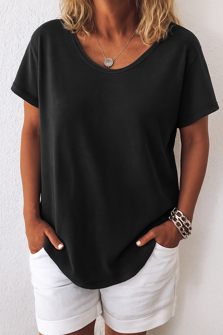 Grijs linnen T-shirt voor dames, luchtig en stijlvol met ronde hals, perfect voor casual zomerdagen.