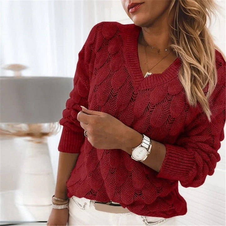 Grijze DoortjesSweater dames pullover, comfortabel en stijlvol voor winter en herfst.