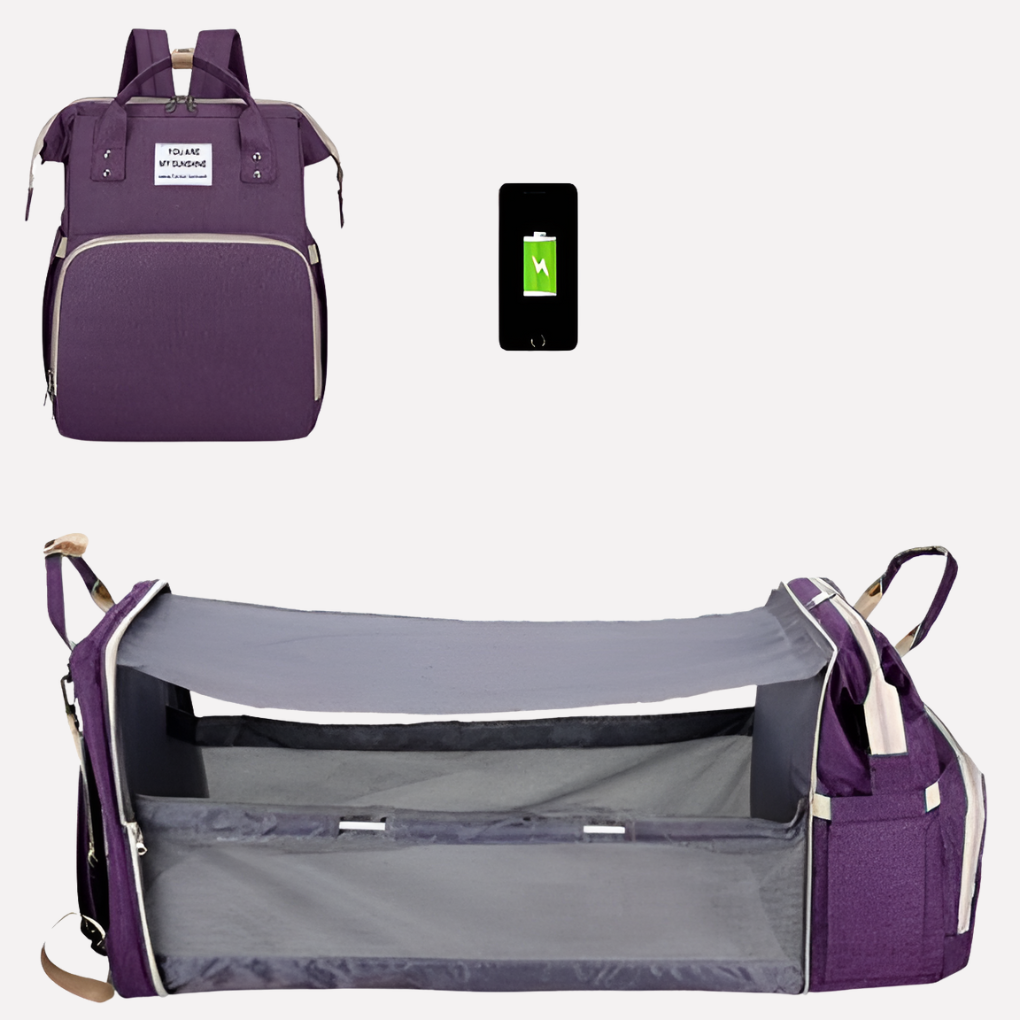 Paarse babytas met ruime vakken en accessoires zoals verschoonmatje. Houdt ouders georganiseerd op pad met baby.
