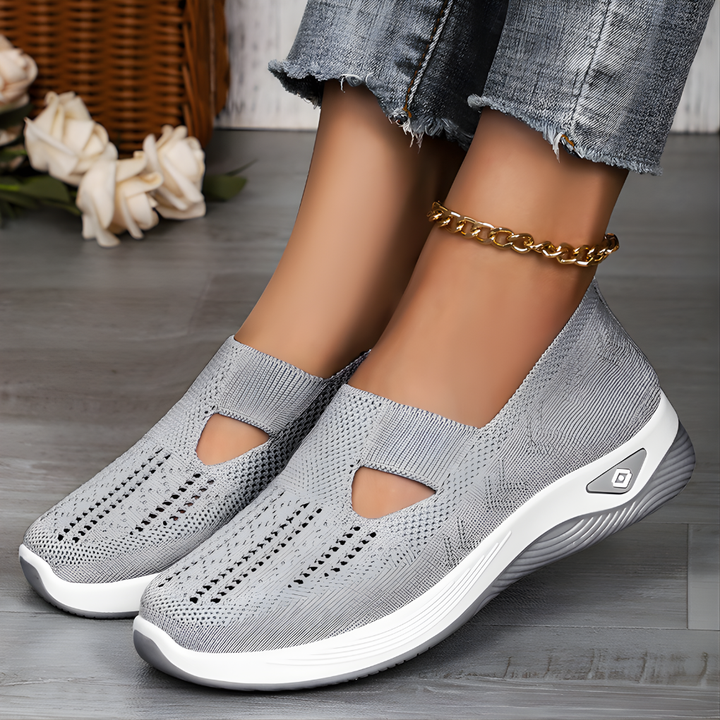 Grijze orthopedische damesschoenen, ademend en ergonomisch, ideaal voor wandelen en dagelijks comfort.