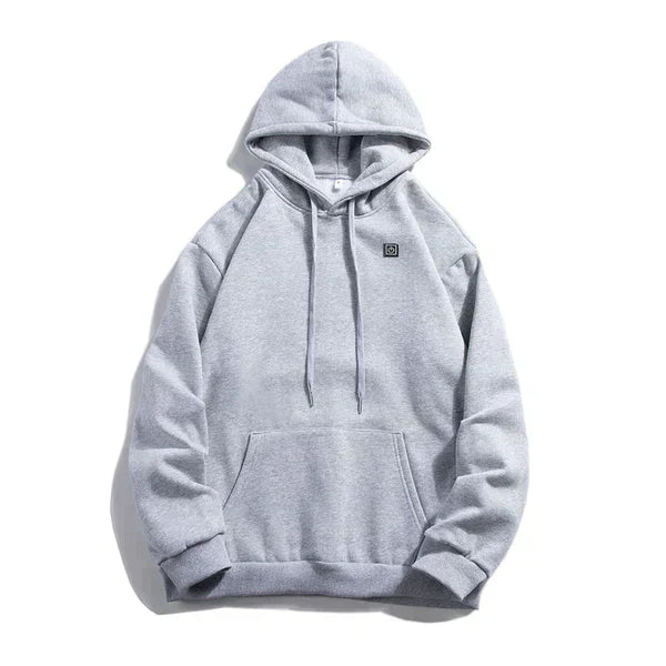 Geniet van ultieme warmte met deze zwarte verwarmde hoodie, de ideale thermokleding voor de winter.