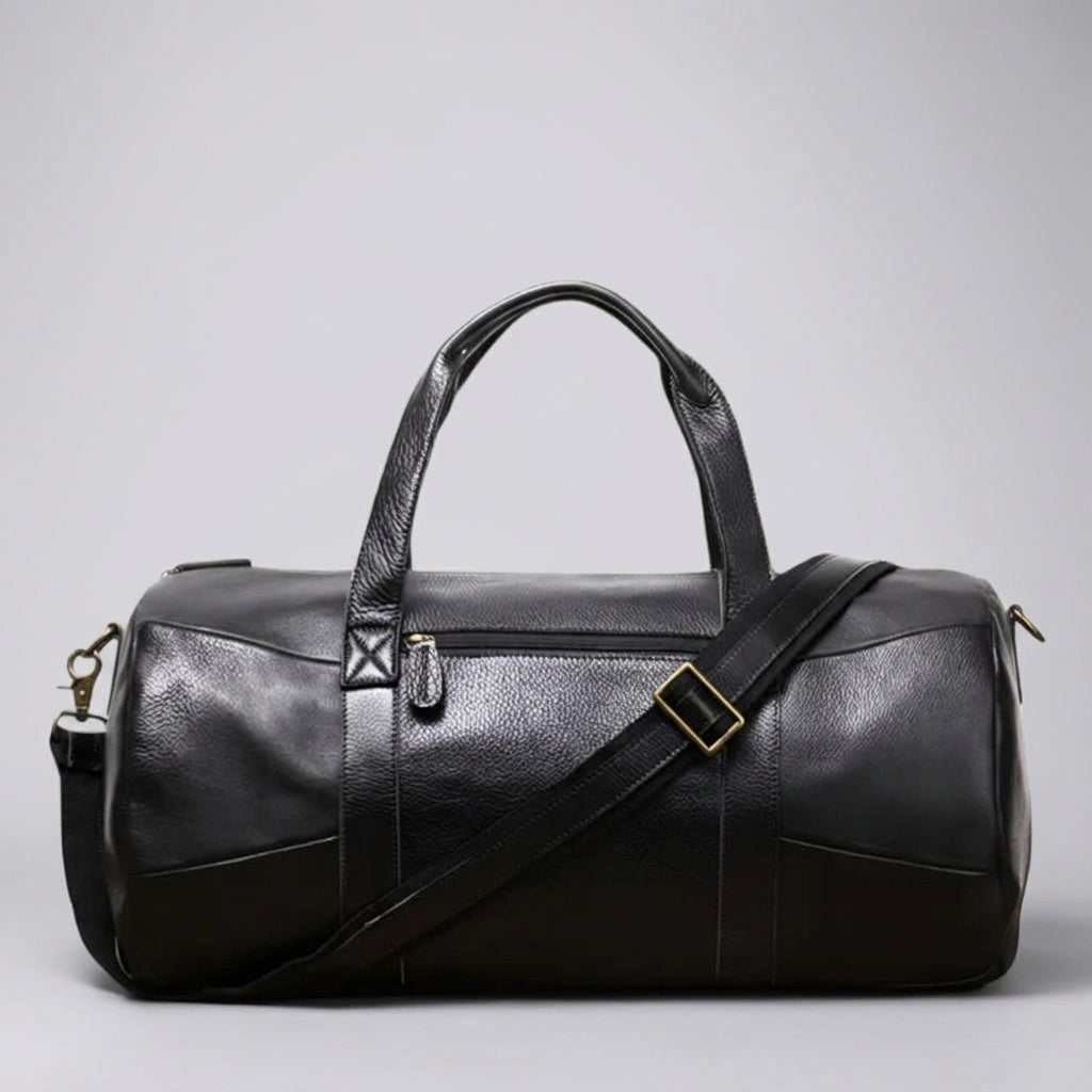 Ruime zwarte duffelbag reistas van Gripwell, unisex en stijlvol, met comfortabele verstelbare schouderband.