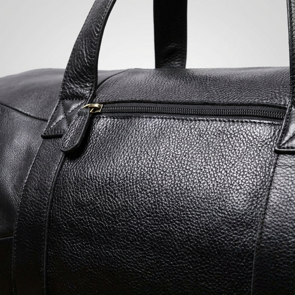 Detail van de Gripwell bruine weekendtas; een praktische en stijlvolle schoudertas voor reizen en bagage.