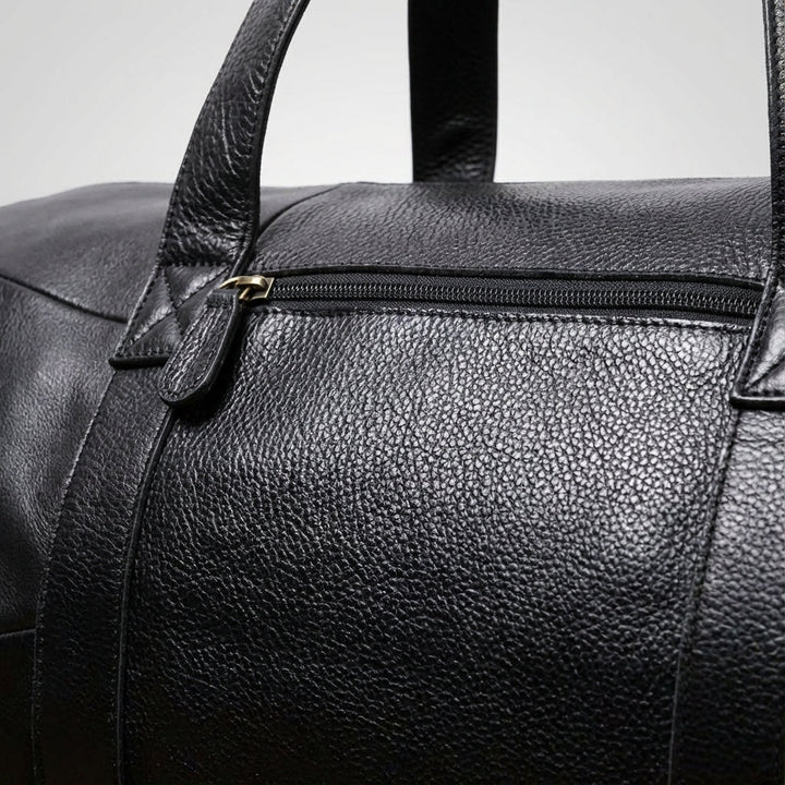 Detail van de Gripwell bruine weekendtas; een praktische en stijlvolle schoudertas voor reizen en bagage.