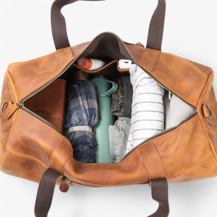 Gripwell zwarte unisex weekendtas, perfect voor reizen. Ruime duffelbag met verstelbare schouderband.